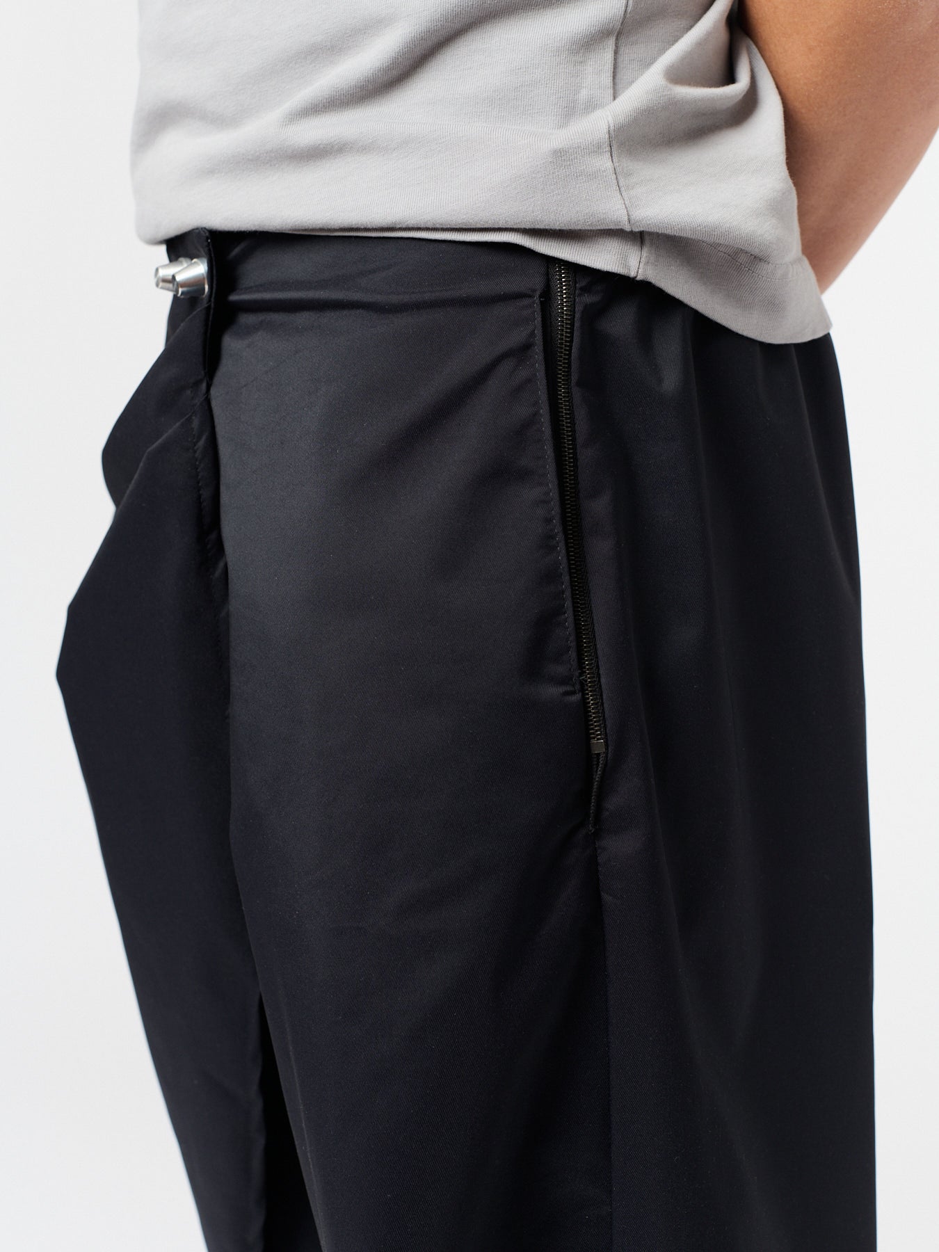 rest defense stud draped trousers in raven black